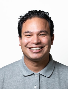 Carlos Molina, Assistant Vice President of Client Success at Vitalacy, smiling in a professional headshot.